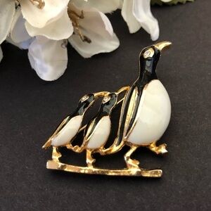 Vintage Penguins marching Brooch Goldtone enamel rhinestones